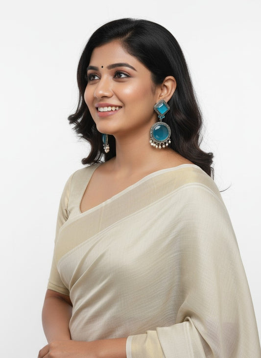 Exquisite Silver Oxidized Dangler Earrings in Tropical Teal Monalisa Stone