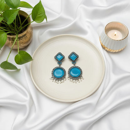 Exquisite Silver Oxidized Dangler Earrings in Tropical Teal Monalisa Stone