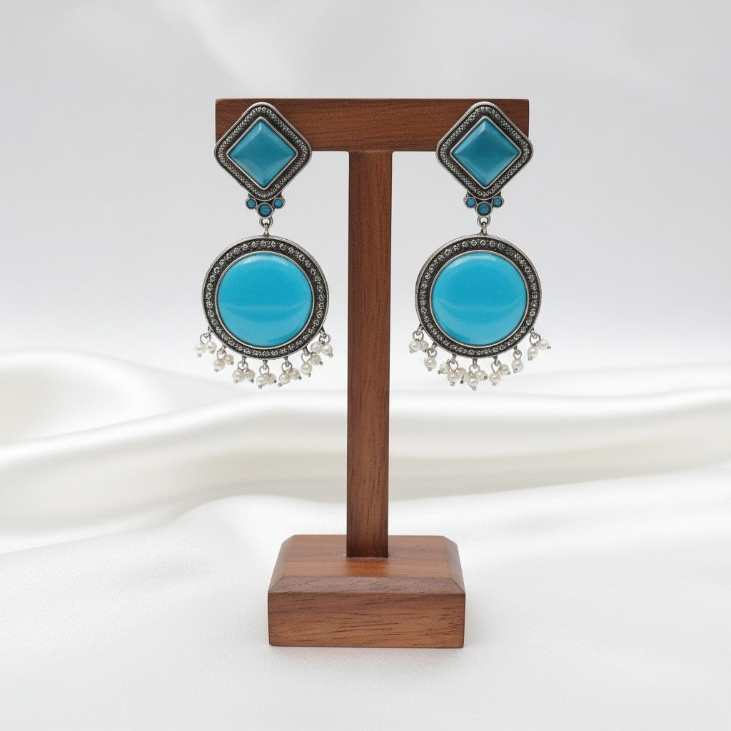 Exquisite Silver Oxidized Dangler Earrings in Tropical Teal Monalisa Stone