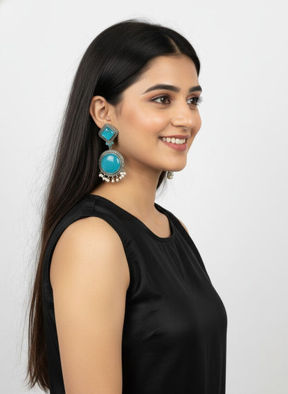 Exquisite Silver Oxidized Dangler Earrings in Tropical Teal Monalisa Stone