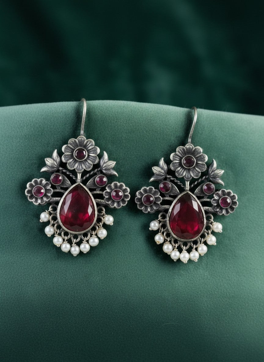 Silver Oxidized Floral Drop Earrings with Red Stones & Pearl Cluster Detailing for Women - Office & Casual Wear