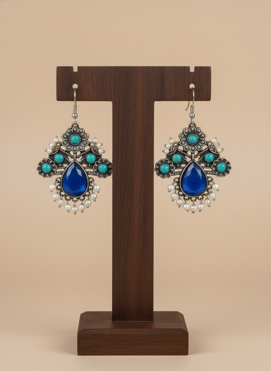 Silver Oxidized Floral Drop Earrings with Dark Blue Aqua Monalisa Stones & Pearl Cluster Detailing for Women - Office & Casual Wear