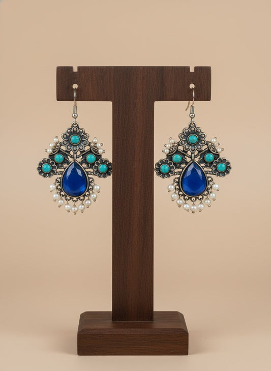 Silver Oxidized Floral Drop Earrings with Dark Blue Aqua Monalisa Stones & Pearl Cluster Detailing for Women - Office & Casual Wear