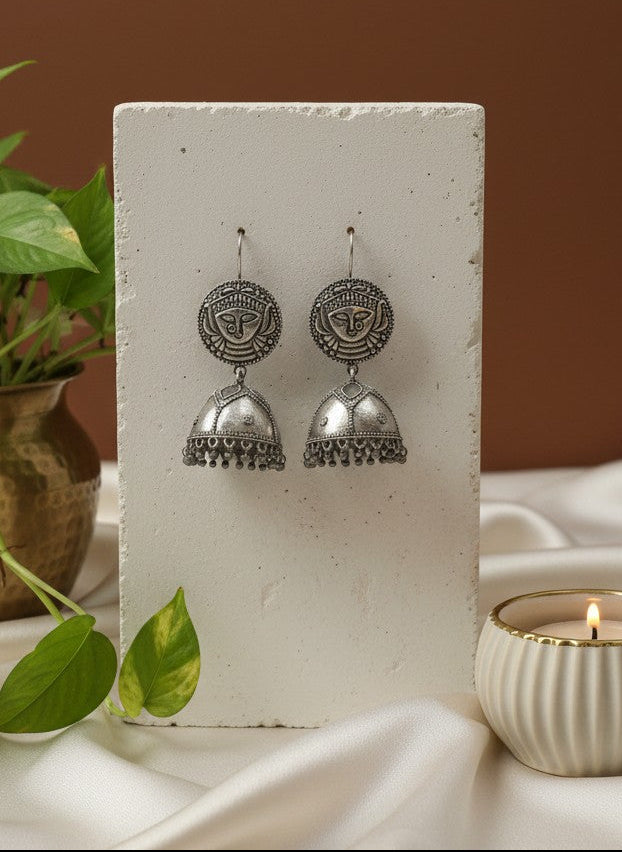 Devi Face Motif Silver Oxidized Hook Jhumka Earrings with Ghungroo Accents for Women - All Occasions
