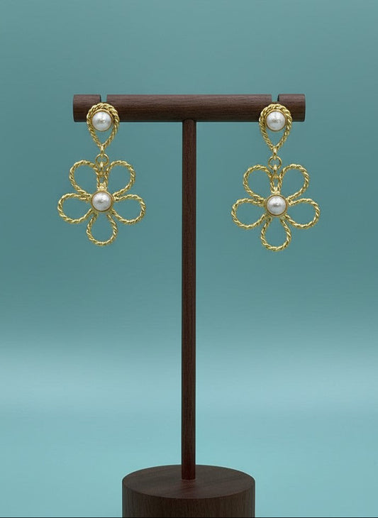 On a display stand Gold-Plated Twisted Floral Pearl Drop Earrings for Women - All Occasion Wear 