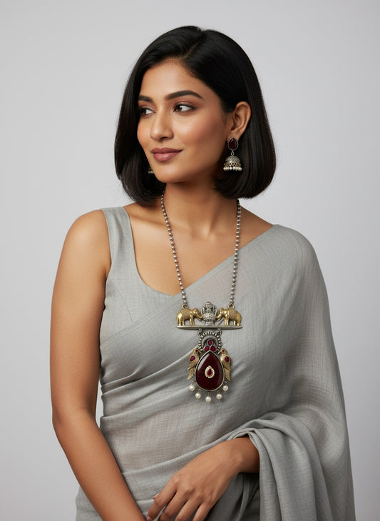 Two Tone Oxidized Necklace set with Elephant motifs and Jhumkis