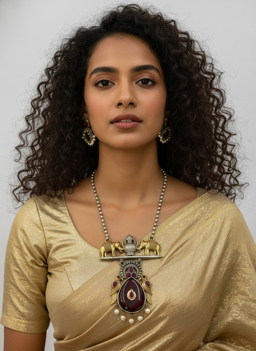 Two Tone Oxidized Necklace set with Elephant motifs and Jhumkis
