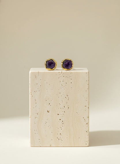 Raw amethyst stud earrings set in gold. Minimalist natural gemstone jewelry with organic texture—perfect for everyday elegance and timeless styling.