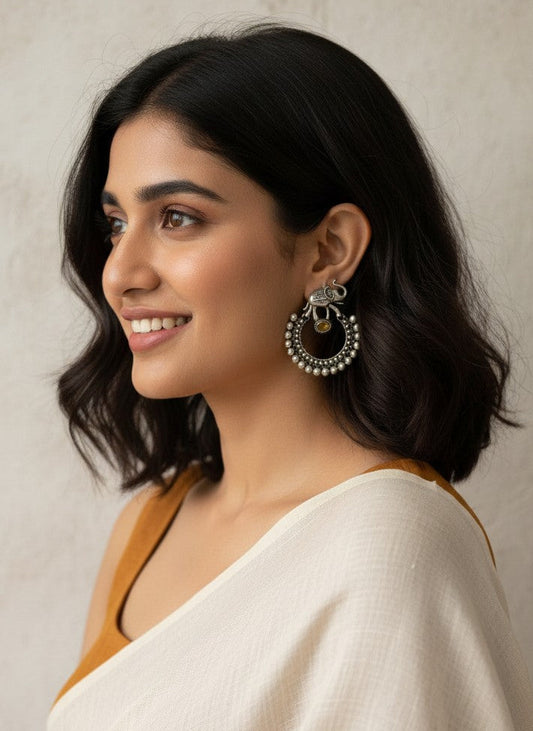 Model wearing Silver Oxidized Chandbali Style Elephant Motifs Earrings for Women - Special Occasions 