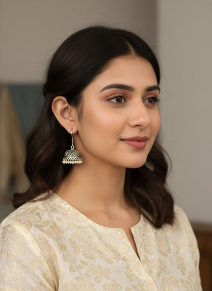 Model wearing Silver Oxidized Classic Jhumka Earrings with Intricate Filigree Detailing for Women - Everyday Wear