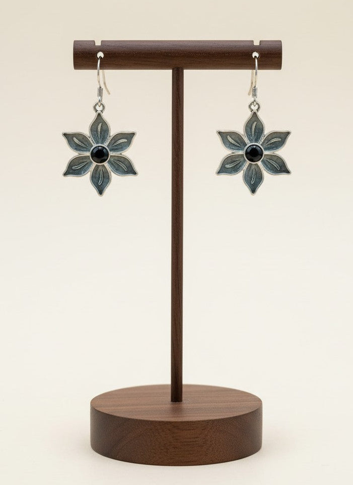 On a display stand Silver Oxidized Floral Black Stone Hook Earrings for Women - Everyday Wear 