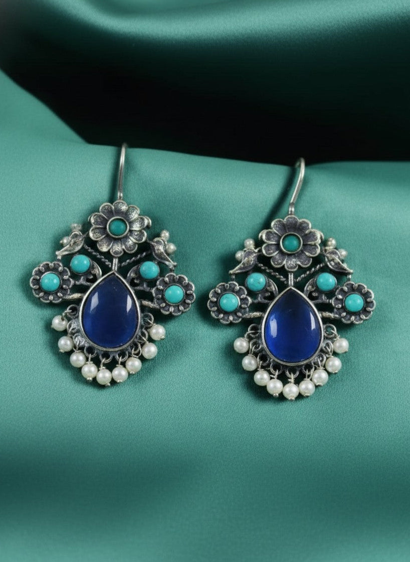 Silver Oxidized Floral Drop Earrings with Dark Blue Aqua Monalisa Stones & Pearl Cluster Detailing for Women - Office & Casual Wear