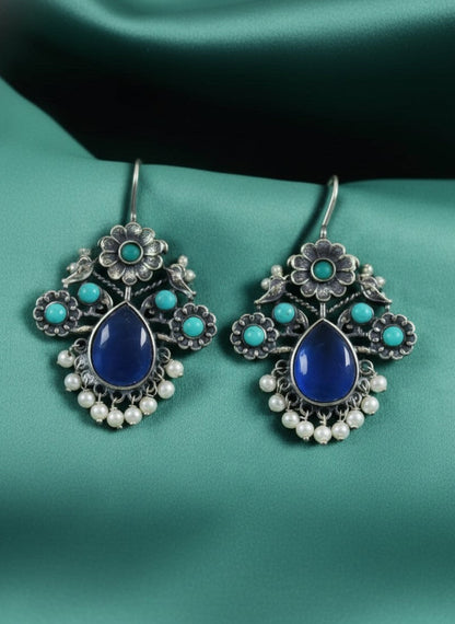 Silver Oxidized Floral Drop Earrings with Dark Blue Aqua Monalisa Stones & Pearl Cluster Detailing for Women - Office & Casual Wear