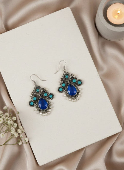 Silver Oxidized Floral Drop Earrings with Dark Blue Aqua Monalisa Stones & Pearl Cluster Detailing for Women - Office & Casual Wear