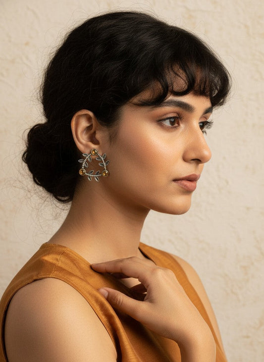 Model wearing Silver Oxidized Geometric Pattern Leaf-Inspired Earrings for Women - All Occasions