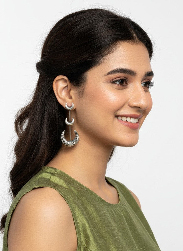 Model wearing Silver Oxidized Half Moon Dangler Earrings for Women - Special Occasions