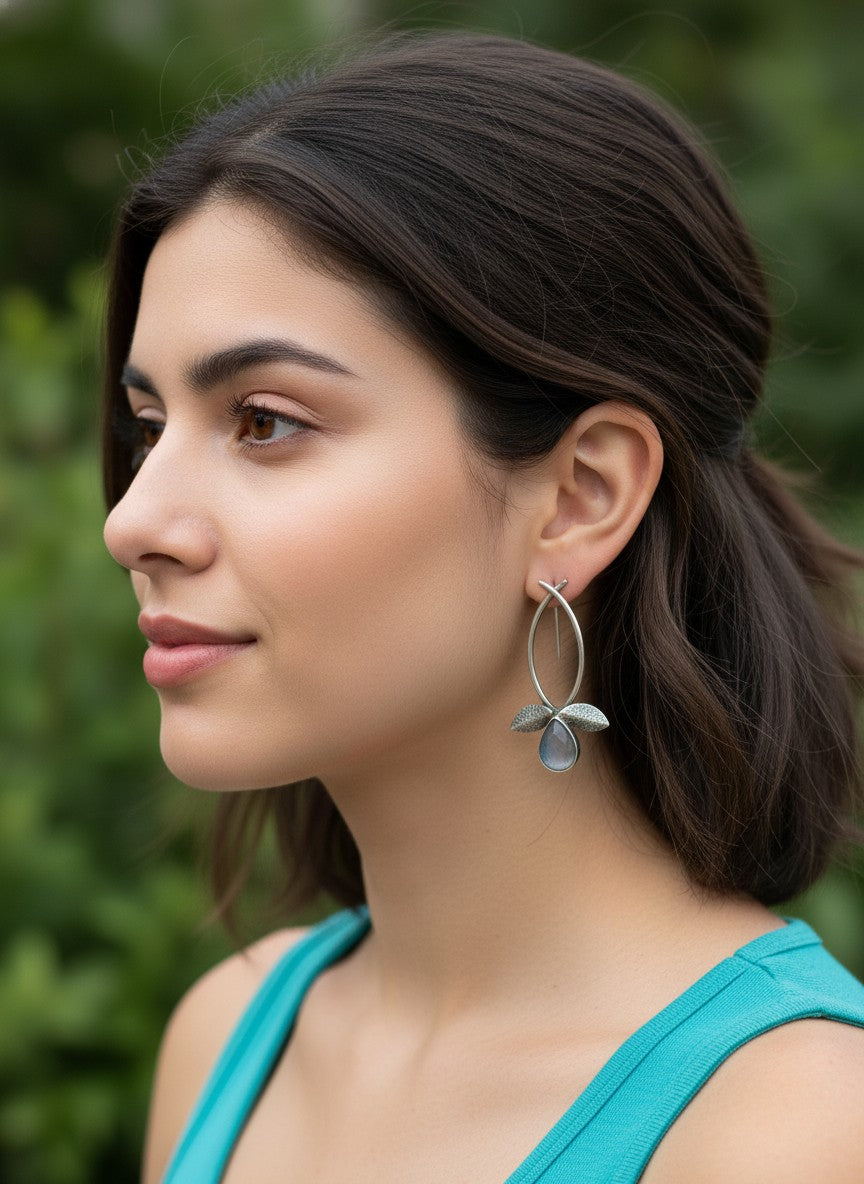 Model wearing Silver Oxidized Leaf Design Earrings with Grey Stone Drop for Women - All Occasions Wear