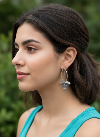 Model wearing Silver Oxidized Leaf Design Earrings with Grey Stone Drop for Women - All Occasions Wear