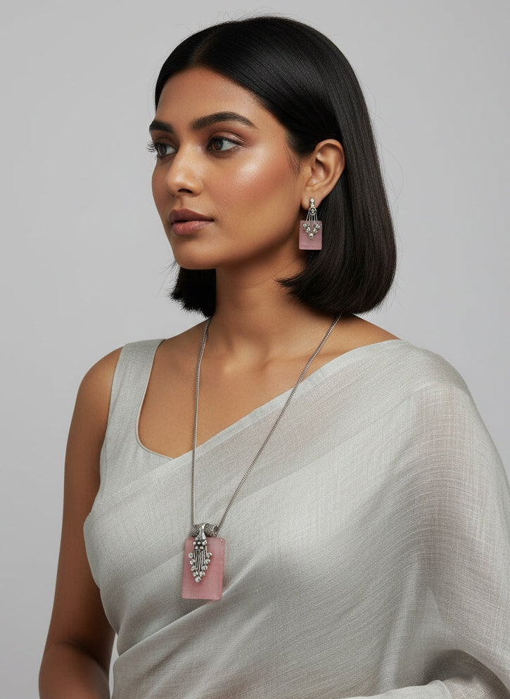 Model wearing Silver Oxidized Neck chain Pendant Necklace set in Geometric pattern Rose Quartz Monalisa Stones for Women - Everyday Wear