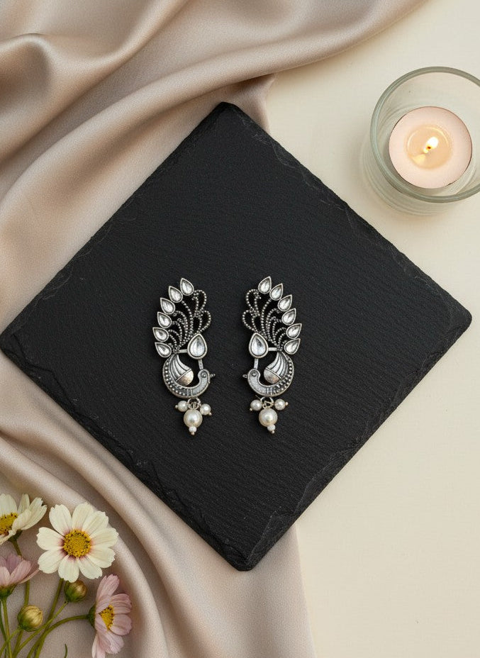 Silver Oxidized Peacock Motif Studs Earrings in White Stones and Pearl Drop for Women - Ethnic Wear