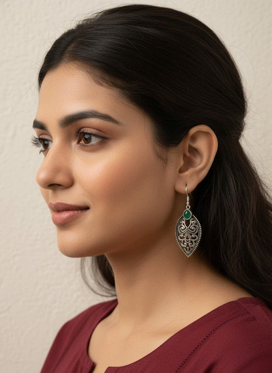 Model wearing Verdant Filigree Leaf Hook Earrings with Green Accent Stone for Women - Everyday Wear
